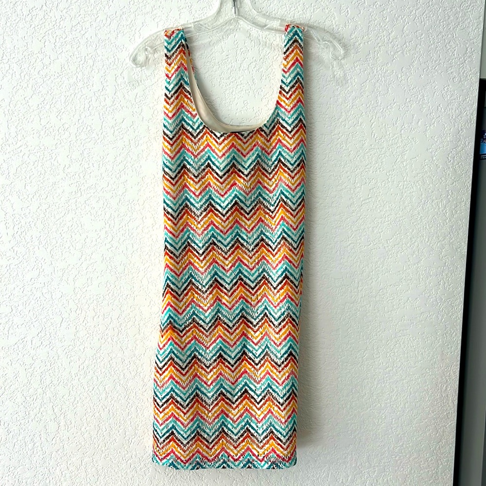 Women’s size large Soprano dress. Cream with many colors